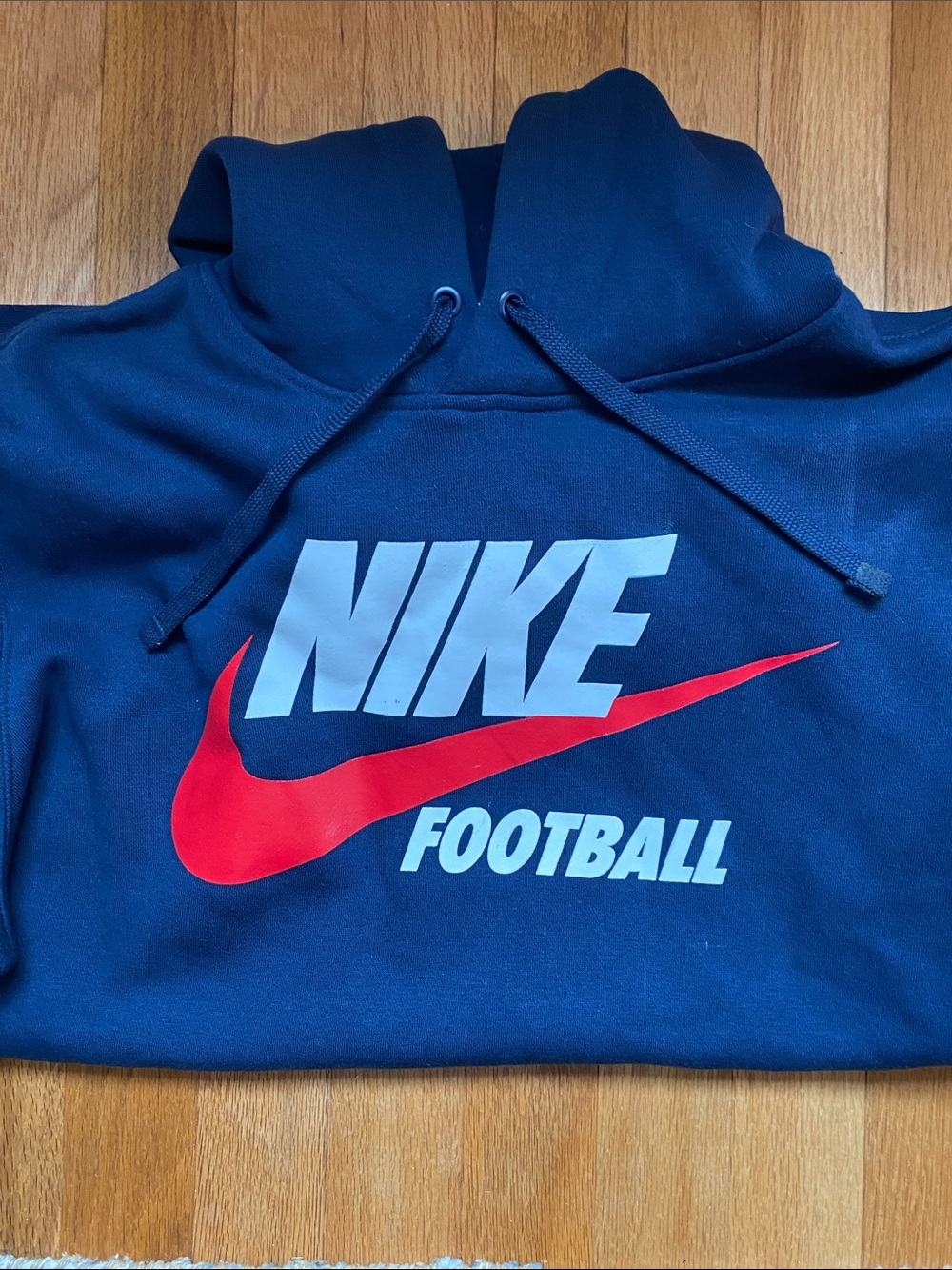 Nike Navy Hoodie with White Logo and Red Swoosh